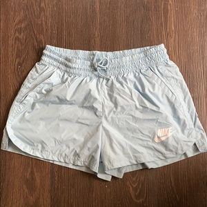 light blue NIKE shorts